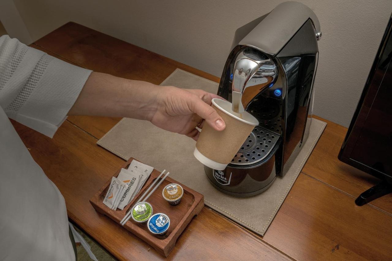 Wyndham Puerto Varas Pettra Kültér fotó A Nespresso coffee machine